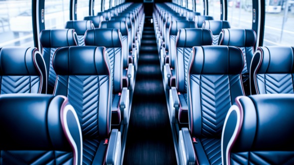 vista 55 passenger charter bus inside