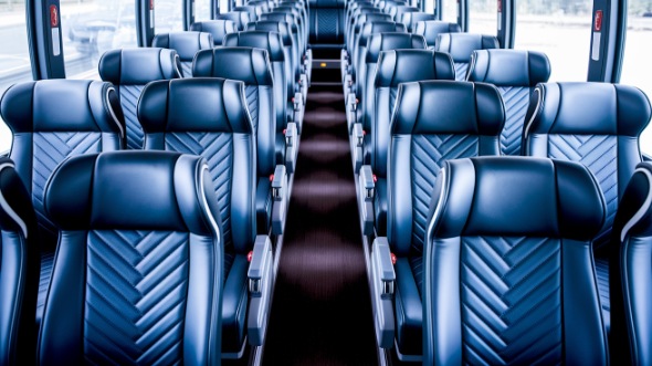 vista 56 passenger charter bus inside